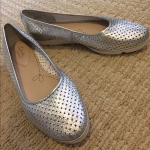 Clarks sporty silver slip ons